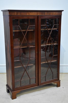 Lot 191 - A 1920s mahogany display cabinet, with two...