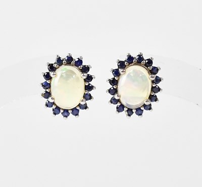 Lot 638 - A pair of white metal stud cluster earrings...