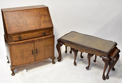 Lot 42 - A mid-20th century walnut bureau with fall...