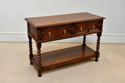 Lot 96 - An 18th century style oak two drawer side...