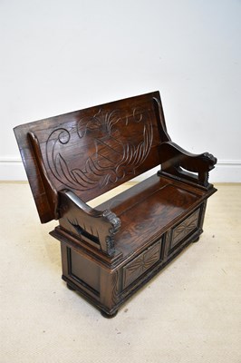 Lot 102 - A carved oak monk's bench, height 61cm, width...