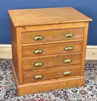 Lot 2993 - A pine chest of four drawers on plinth base,...