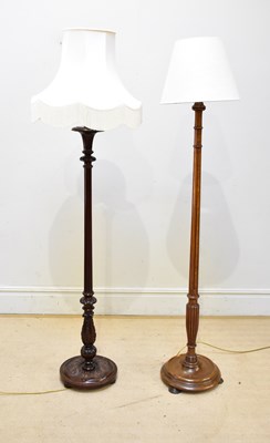 Lot 648 - An oak standard lamp, with fluted detailing,...