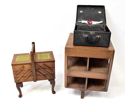 Lot 46 - A mid-20th century mahogany revolving bookcase,...