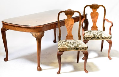 Lot 76 - An early/mid-20th century walnut part dining...