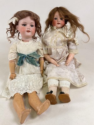 Lot 138 - A Heubach 275 and a Armand Marseille 390 doll,...