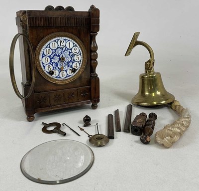 Lot 713 - A wooden cased mantel clock, with enamelled...