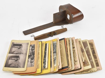 Lot 363 - A vintage stereoscope and cards.