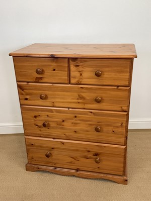 Lot 824 - A pine chest of two short over three graduated...