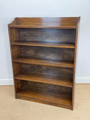 Lot 856 - An oak bookcase with four shelves, height...