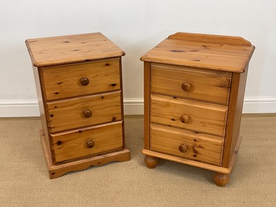 Lot 861 - Two pine bedside units with three drawers, one...