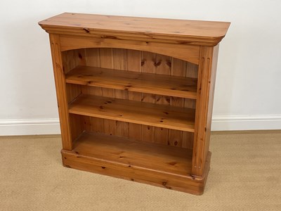 Lot 828 - A pine bookcase with two shelves, height 90cm,...