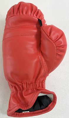Lot 1942 - MUHAMMAD ALI; a signed single boxing glove,...