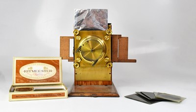 Lot 165 - A mahogany cased magic lantern with brass...