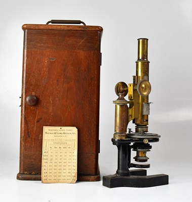 Lot 149 - A brass and lacquered monocular microscope by...