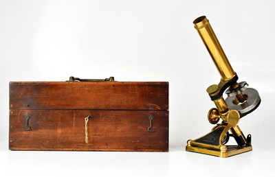 Lot 151 - A brass cased microscope by R. & J. Beck,...