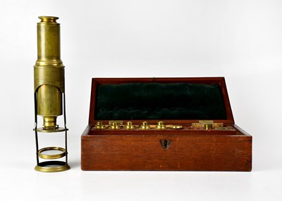 Lot 148 - A brass monocular microscope in a fitted...