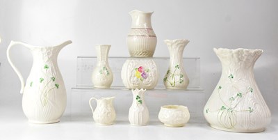 Lot 266 - BELLEEK; nine porcelain items including a...