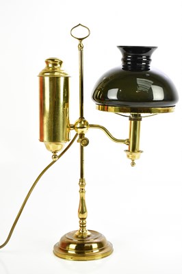 Lot 637 - A modern brass adjustable desk lamp with black...