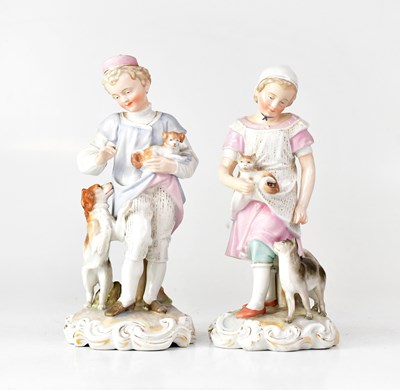 Lot 254 - MEISSEN; a pair of porcelain figures modelled...