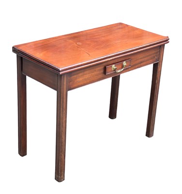 Lot 182 - A George III mahogany foldover tea table with...