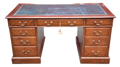 Lot 140 - An early 20th century mahogany kneehole desk,...