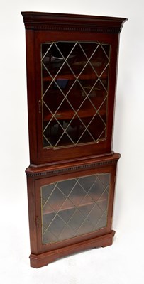 Lot 39 - A Georgian-style mahogany-effect corner...