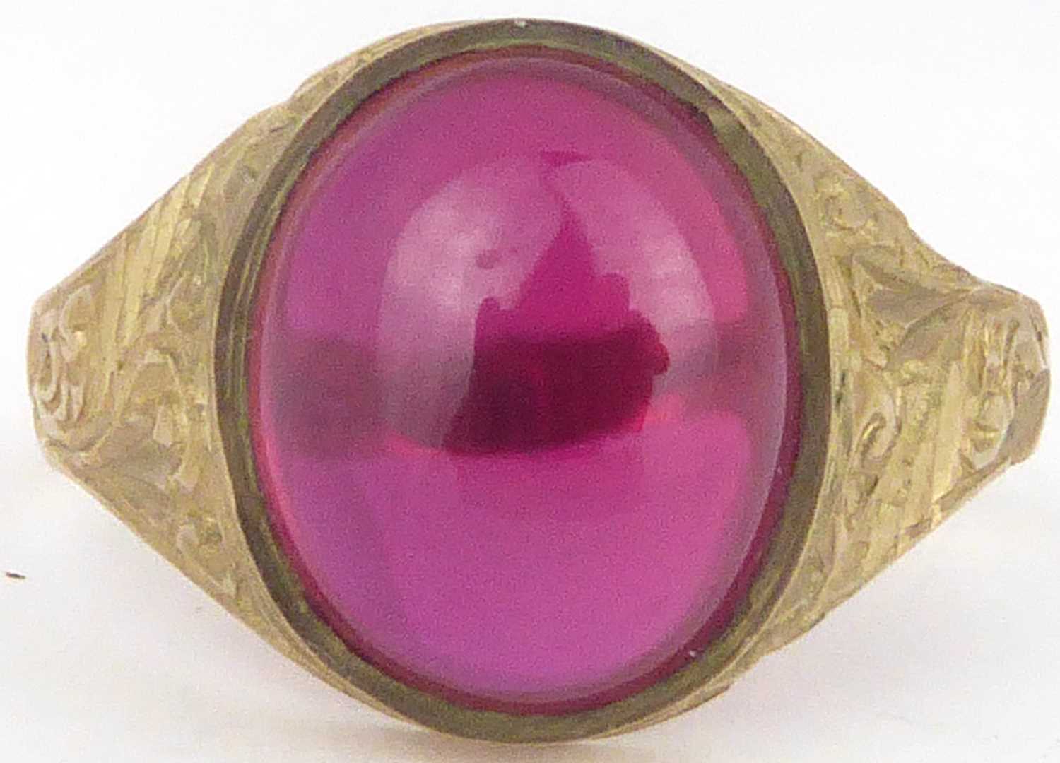 Lot 780 - A vintage 9ct gold ring with oval bezel set...