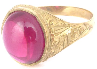 Lot 780 - A vintage 9ct gold ring with oval bezel set...