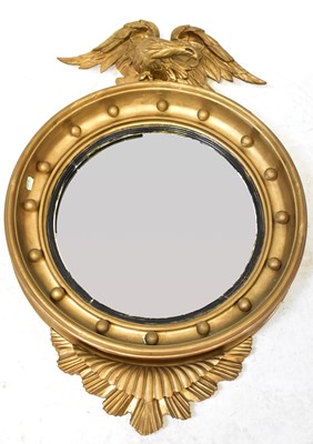 Lot 99 - A circular federal wall mirror surmounted with...