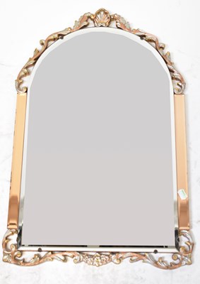 Lot 89 - An early 20th century arched wall mirror with...