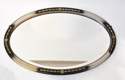 Lot 92 - A contemporary oval wall mirror with bevelled...