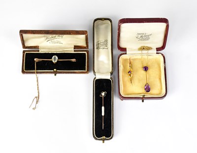 Lot 641 - A tie pin with 15ct yellow gold finial set...