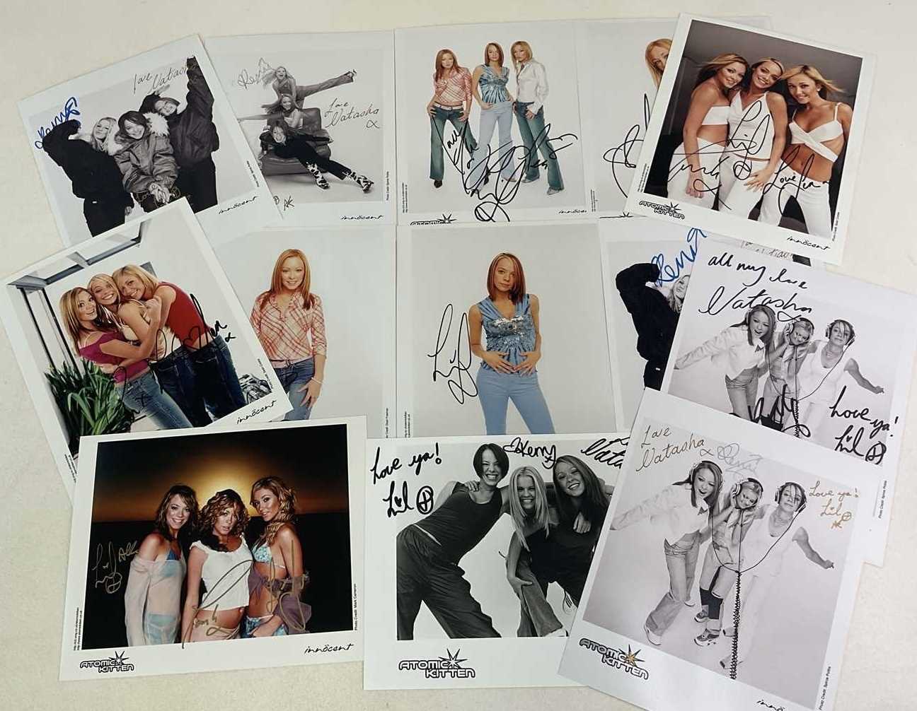 Lot 1606 - ATOMIC KITTEN; thirteen colour and black and...
