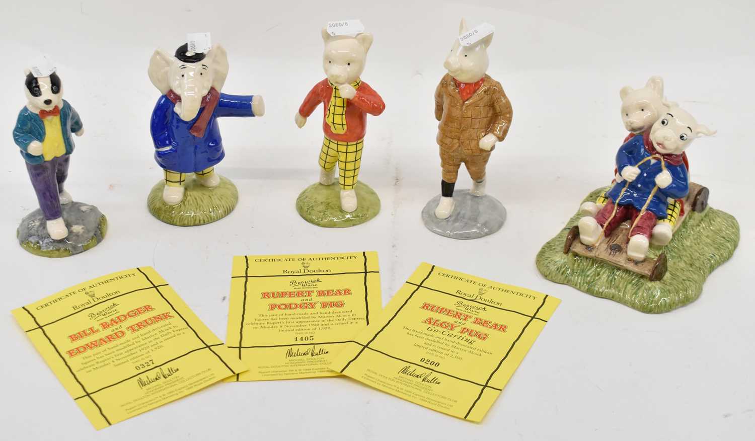 Lot 497 - BESWICK; five assorted Beswick Rupert Bear...