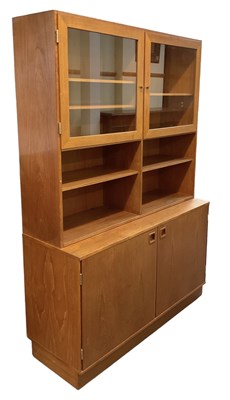 Lot 21 - PETER LOVIG; a teak mid century wall unit,...