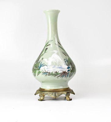 Lot 261 - A 19th century French porcelain vase of bottle...