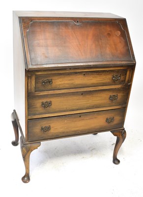 Lot 21 - A reproduction mahogany bureau, with fall...