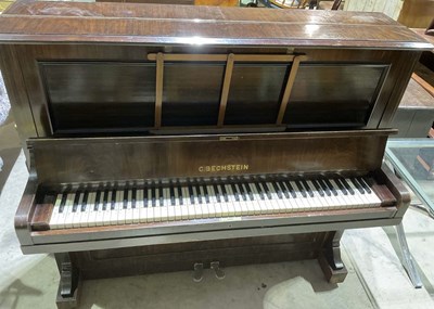 Lot 143 - BECHSTEIN; an upright straight strung piano,...