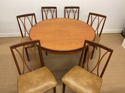 Lot 773 - G PLAN; a Fresco extending teak dining table...
