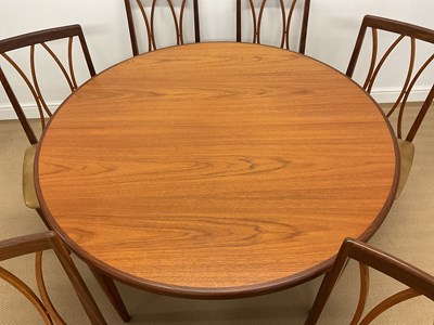 Lot 773 - G PLAN; a Fresco extending teak dining table...