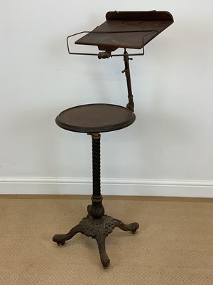 Lot 855 - A 19th century mahogany and cast iron reading...