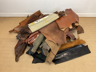 Lot 145 - A quantity of leather and suede, some off-cuts,...