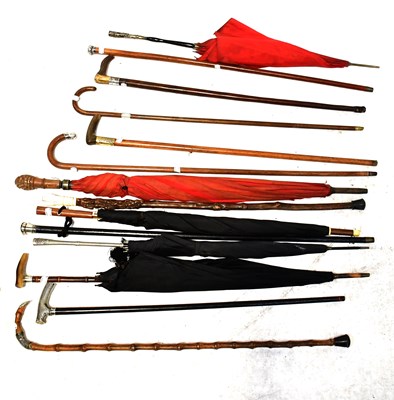 Lot 395 - Fourteen various walking sticks and parasols,...