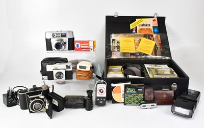 Lot 176 - A quantity of cameras and accessories, to...