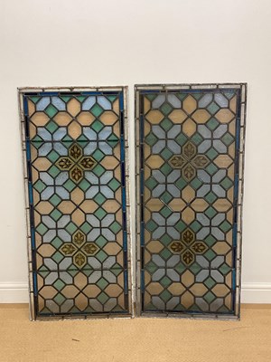 Lot 742 - A pair of leaded and stained glass windows...