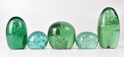 Lot 335 - Five green glass paperweights and dumps, each...