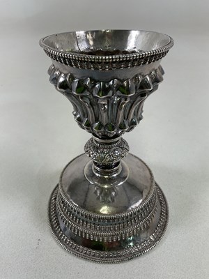 Lot 1435 - A Nepalese white metal pedestal bowl, with...