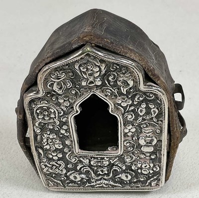 Lot 1446 - A Nepalese white metal and leather prayer box,...