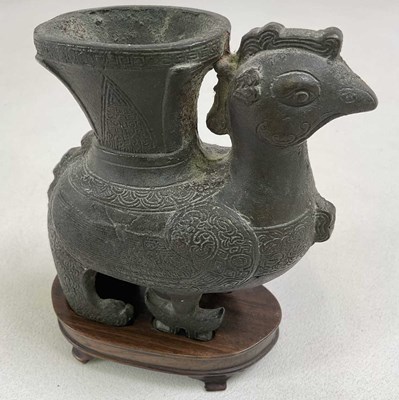 Lot 282 - A Chinese archaistic bronze censer modelled as...